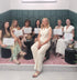 Founder Donna Maneva with DOMA Ritual Lift graduates holding their CPD-accredited diplomas, beside Himalayan singing bowls